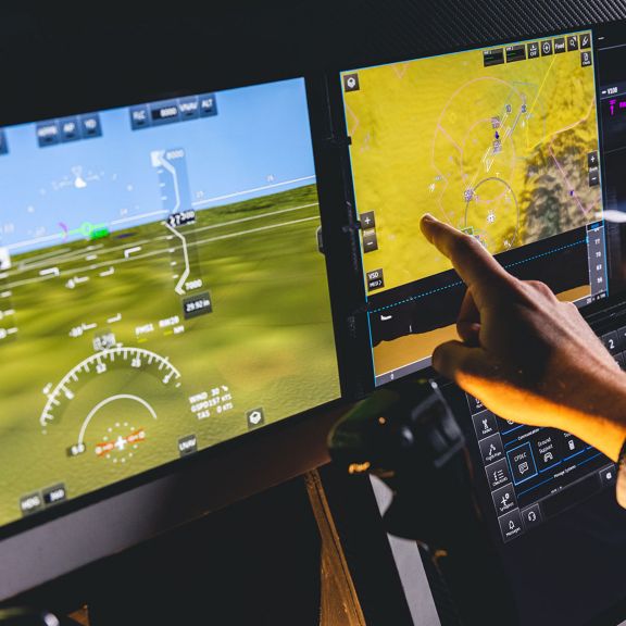 Cabin with two displays to monitor flights