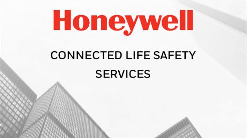 Greyscale buildings and sky CLSS and Honeywell text