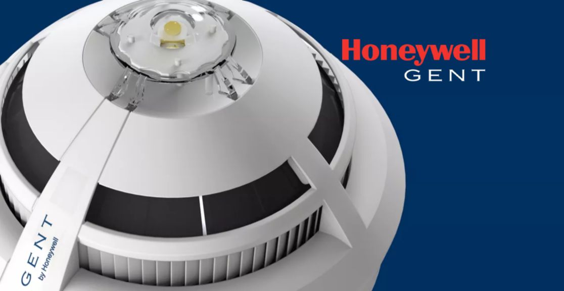 Gent smoke detector on a blue backdrop with the gent logo
