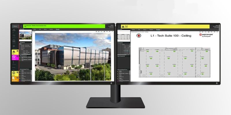 A pair of monitors showing NOTIFIER software