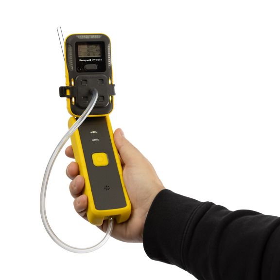 Hand holding a Honeywell Handheld Pump