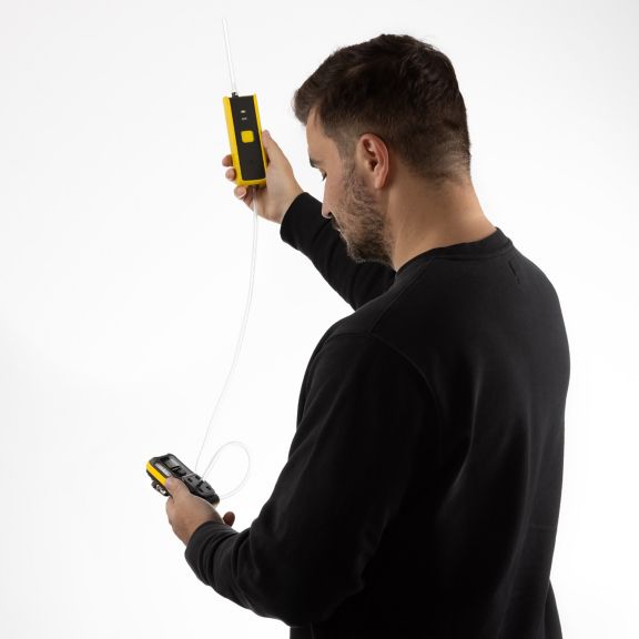 Man using Honeywell Handheld Pump