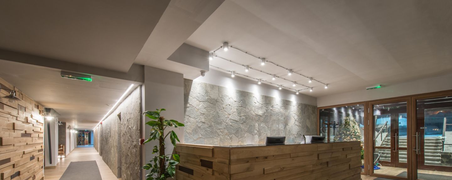 Reception desk and view on hallway in modern hotel