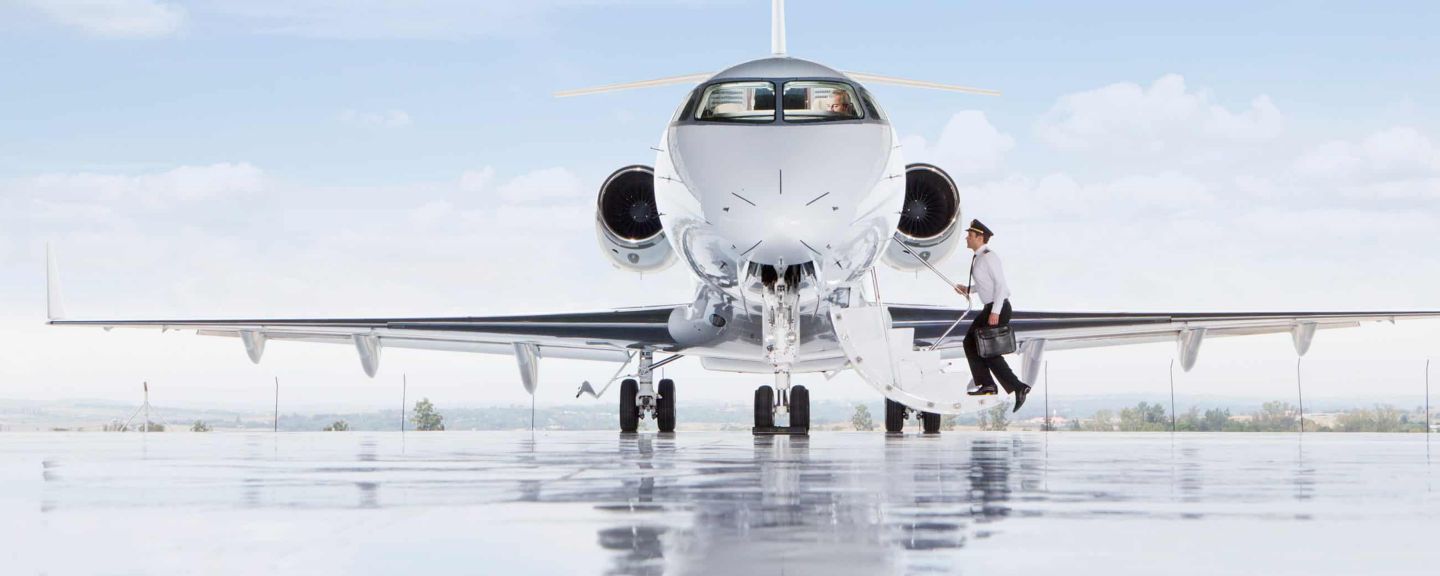 Pilot getting on an aircraft