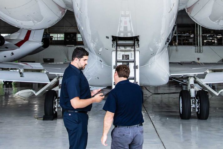 Director of Maintenance Inspecting Rear of G650