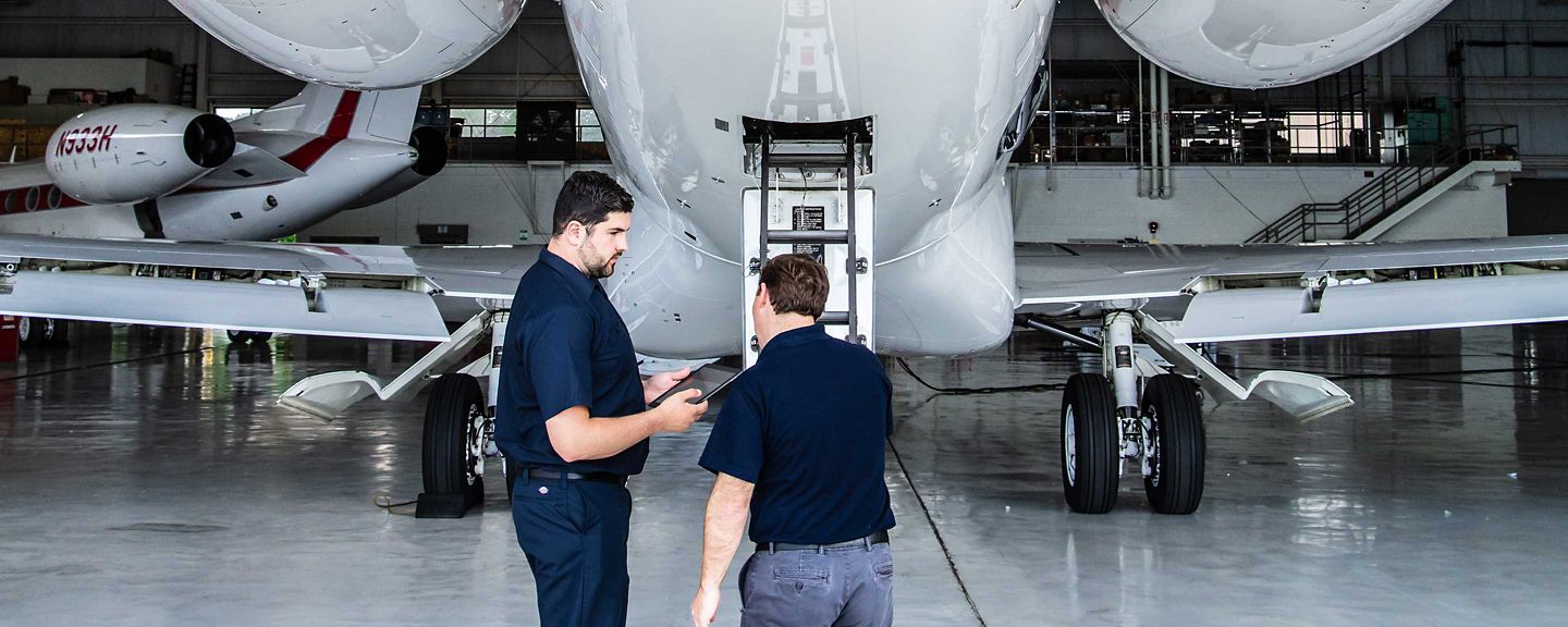 Director of Maintenance Inspecting Rear of G650