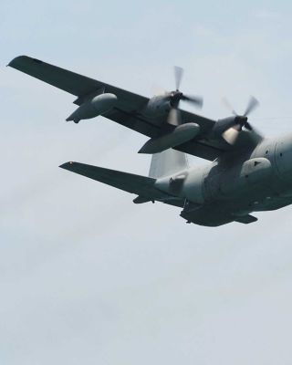 C-130 Aircraft in flight with Honeywell JetWave MCX SATCOM