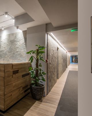 Reception desk and view on hallway in modern hotel