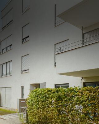 Side view of multi-family housing with balconies