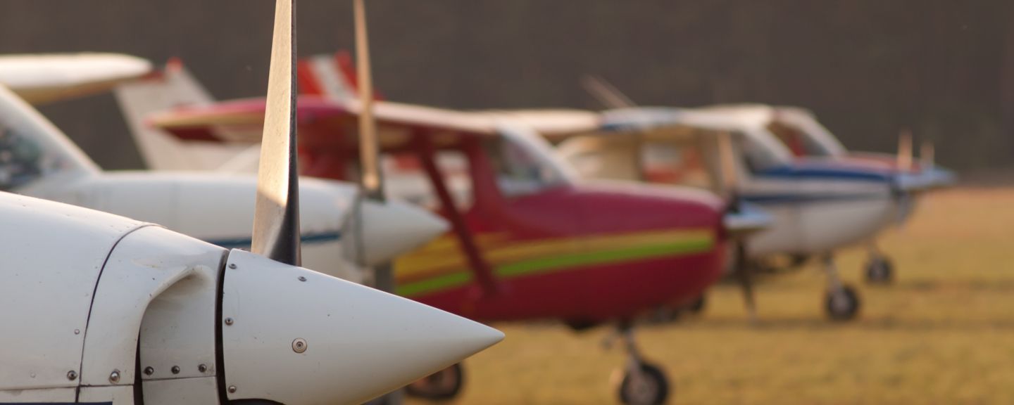 Row of planes' propellers at autumn sunset