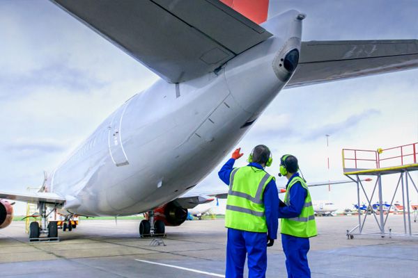 Inspectors making an aircraft visual inspection