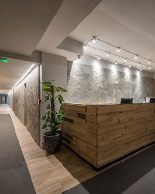 Reception desk and view on hallway in modern hotel