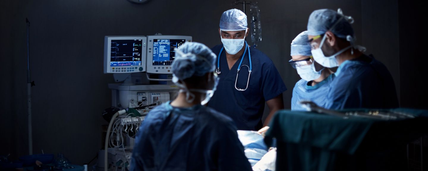 Shot of a team of surgeons performing a surgery in an operating room