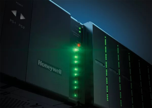 Close-up view of a server rack with green status indicator lights in a data center environment showing active computing systems and hardware.