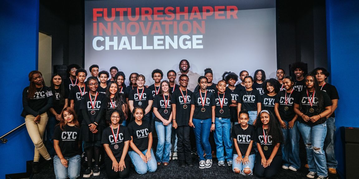 A group of students who participated in the 2024 Futureshaper Innovation Challenge pose in a group photo.