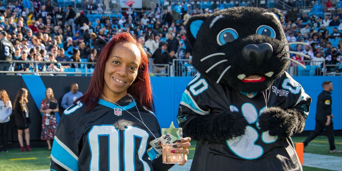 Teacher LaTasha Monford at the Carolina Panthers stadium