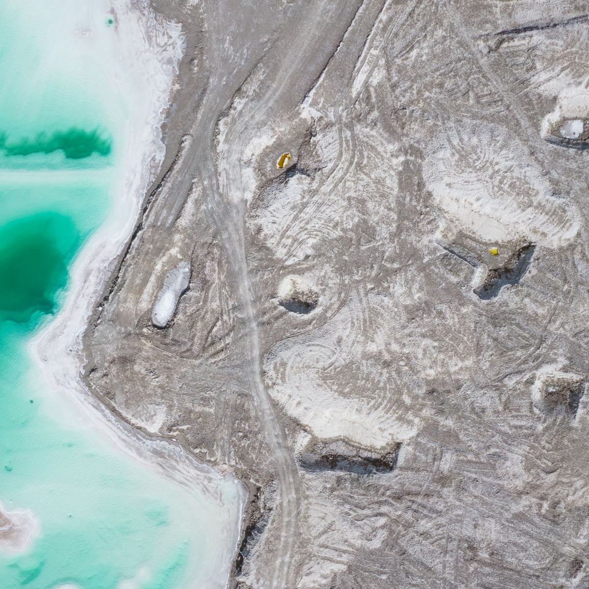 Aerial lithium brine evaporation pond mining operation