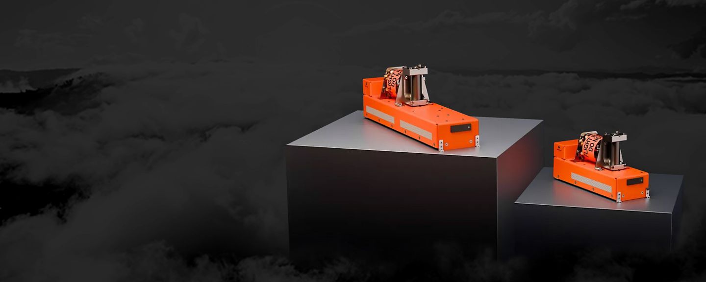 Two Honeywell HCR-25 aircraft showcased in a cloud-filled sky