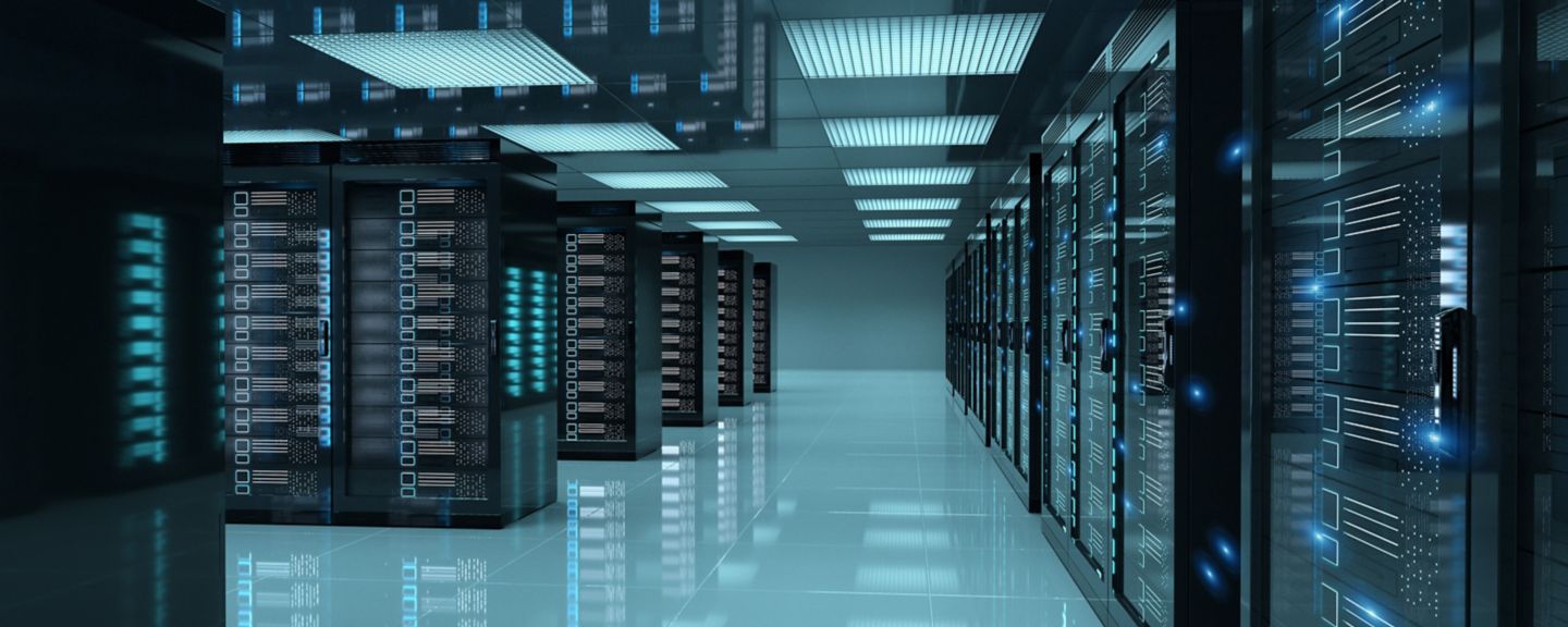 Rows of glowing servers in a high-tech data center