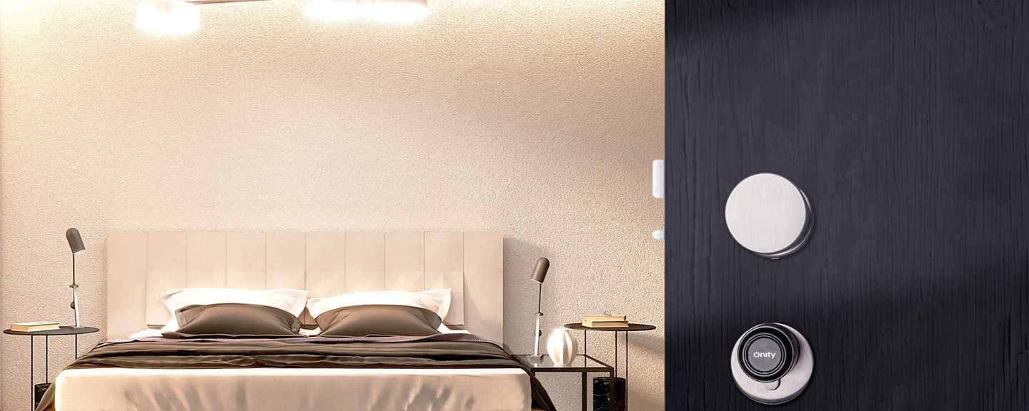 Bedroom view from a door featuring a smart lock