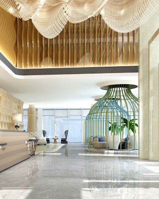 Spacious lobby with modern decor, lighting, and seating area.