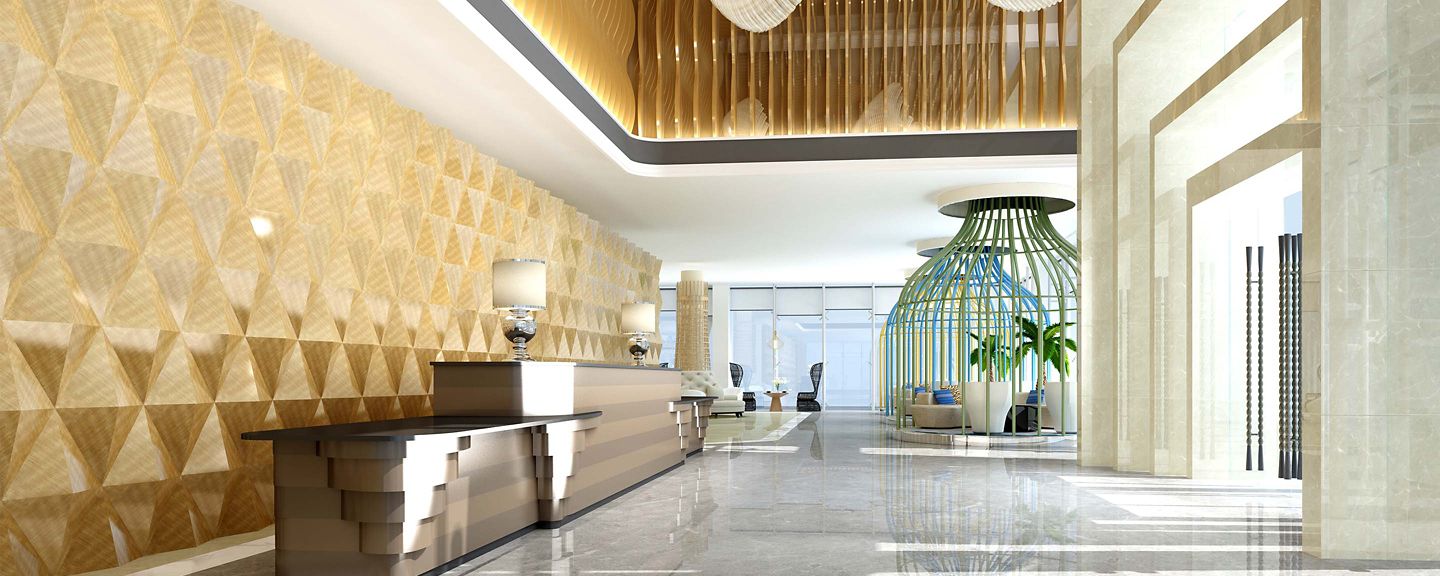 Spacious lobby with modern decor, lighting, and seating area.