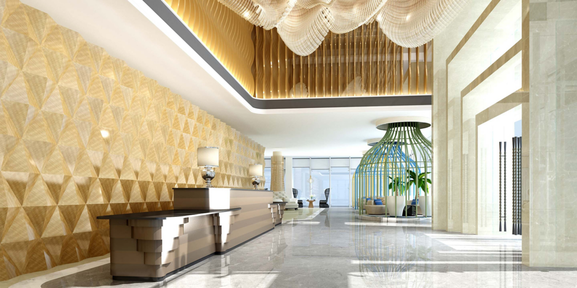 Spacious lobby with modern decor, lighting, and seating area.