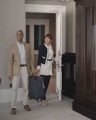 Onity Serene Lock couple entering hotel room