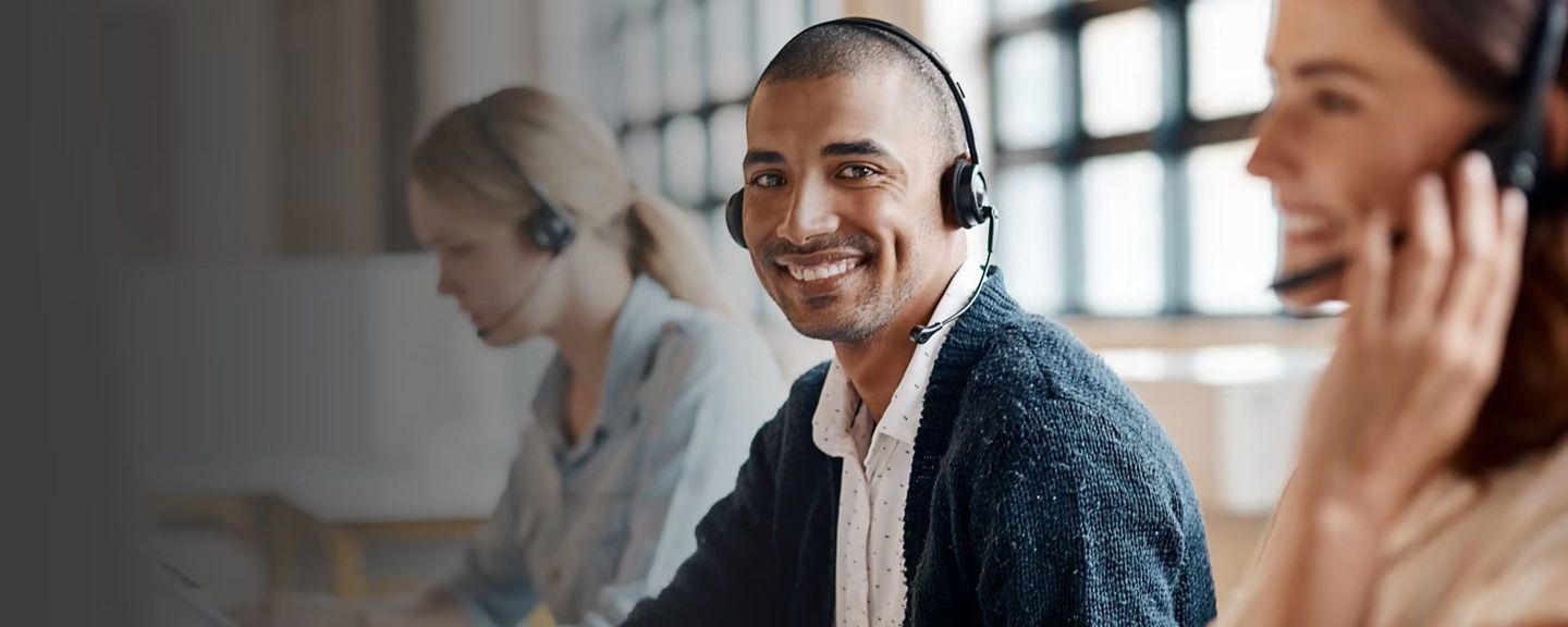 Onity Support Team Three Workers With Headsets