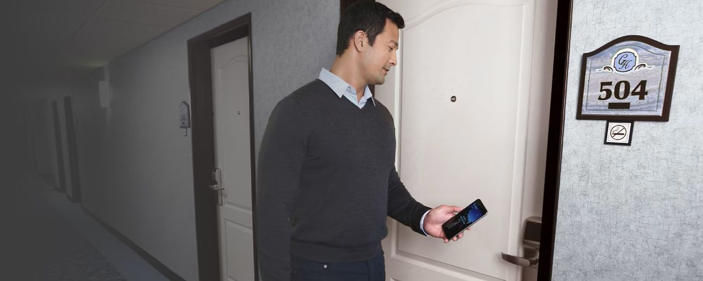 Onity Trillum Lock Man Entering Hotel Room