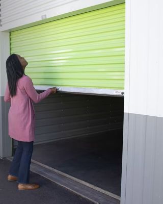 Onity Woman Opening Passport Self Storage Lock