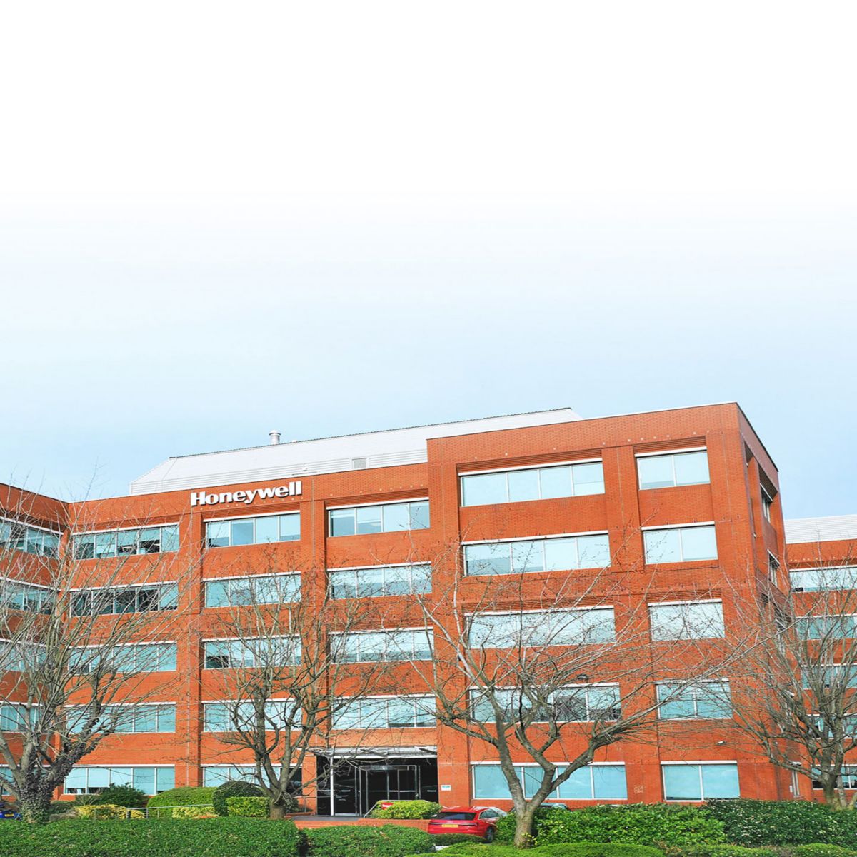 View Honeywell’s Bracknell office building, a modern corporate campus with contemporary design, landscaped surroundings, and professional workspace in the UK.
