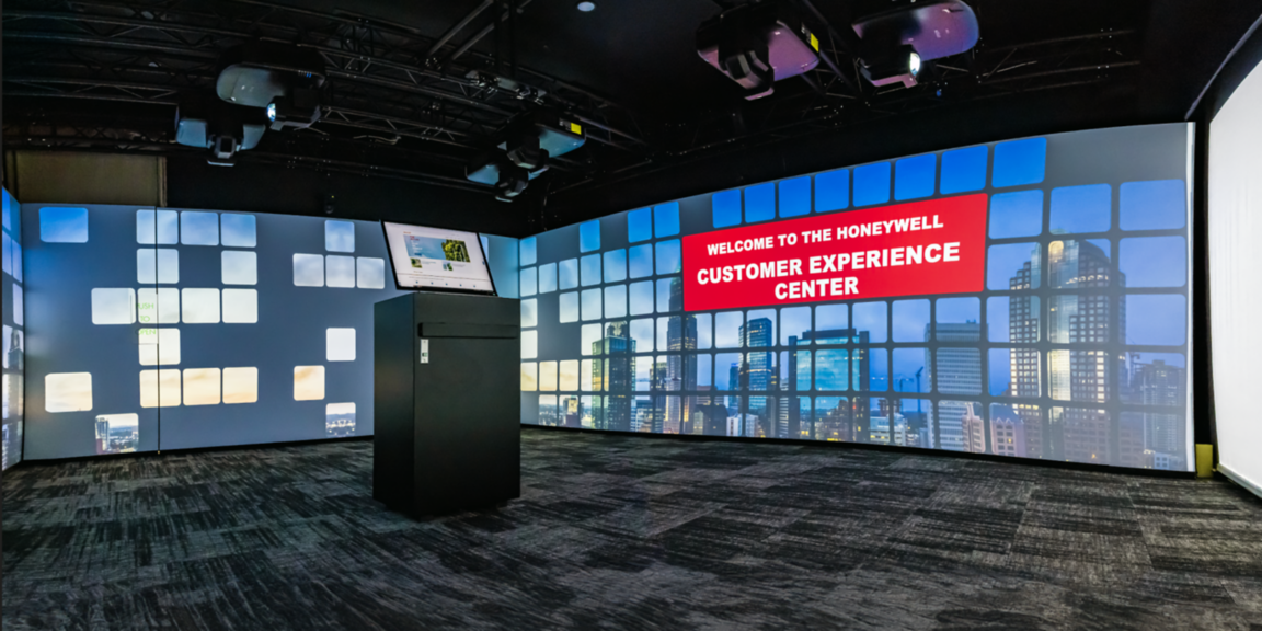 Large-scale digital wall at Honeywell highlighting innovation, ESG initiatives, industrial software, and the future of connected enterprise solutions.