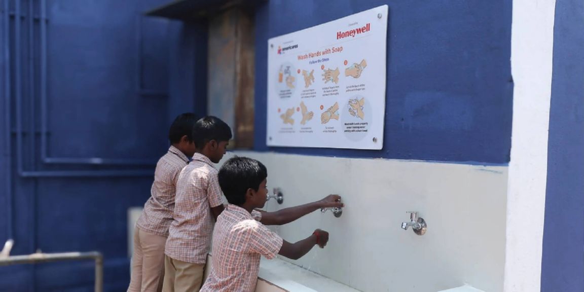 Children Practicing Handwashing at School Hygiene Facility