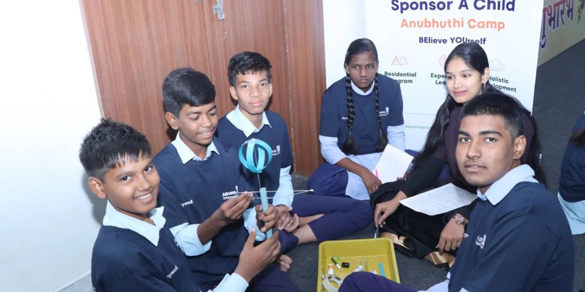 Students Participating in STEM Learning Activities at Anubhuti Camp