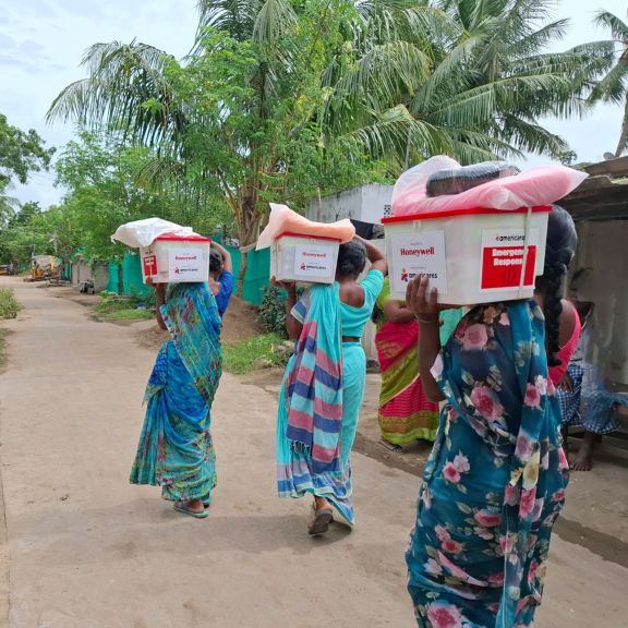 Humanitarian teams provide essential emergency relief kits to rural families, supporting communities with critical supplies during crisis situations.