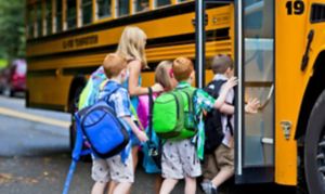 Children Boarding Yellow School Bus in Morning Routine