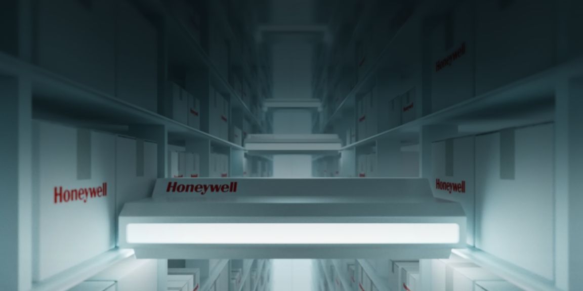 A dimly lit warehouse aisle showcasing organized white boxes with the Honeywell logo prominently displayed, creating a futuristic atmosphere.