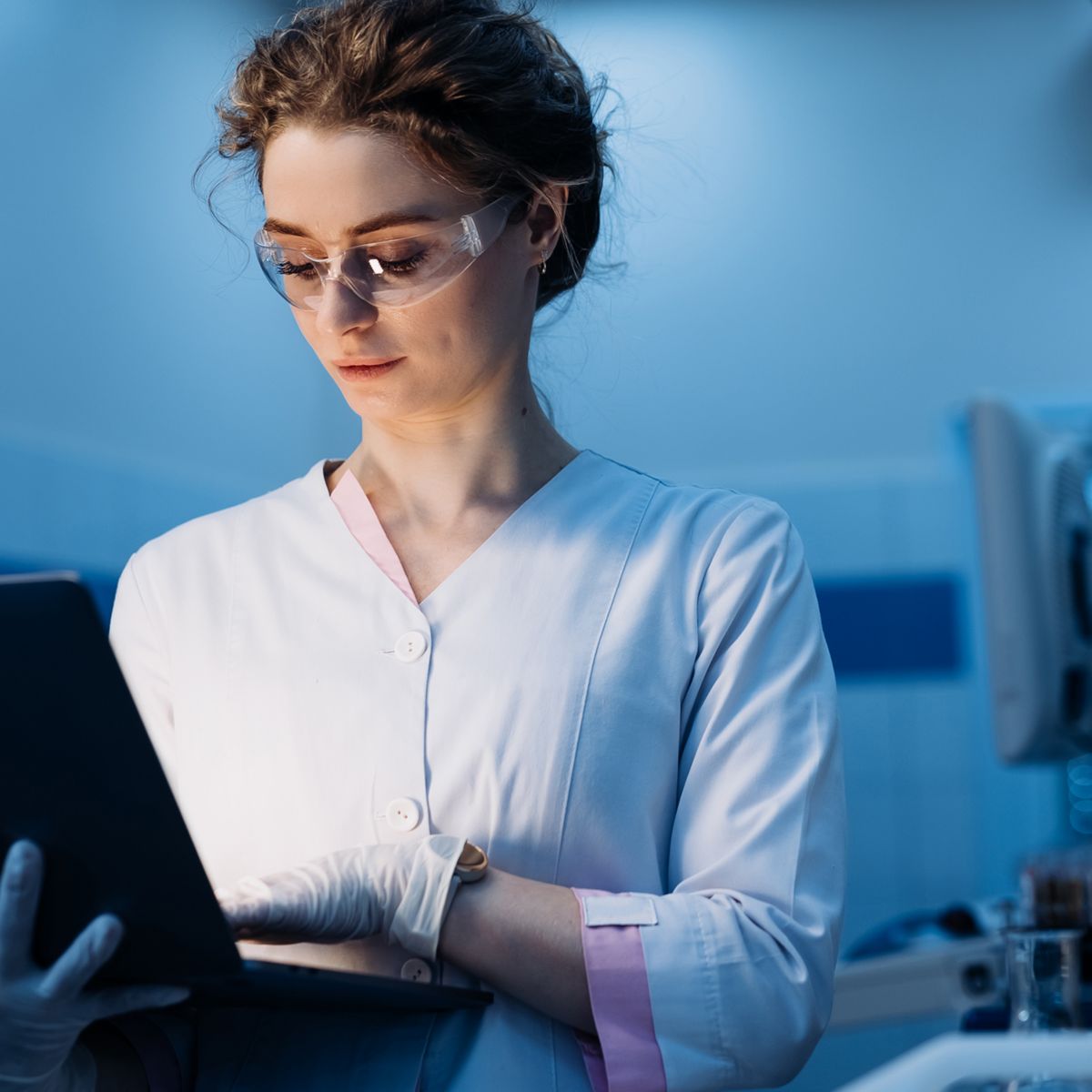 Researcher holding a laptop