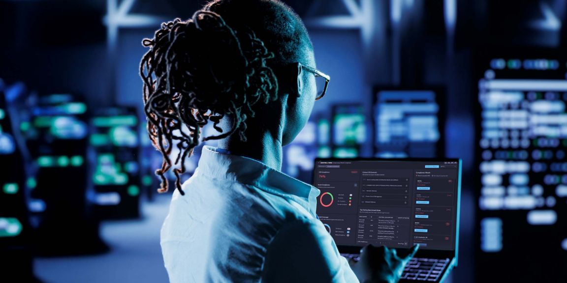 Cybersecurity expert checking dashboard on laptop screen