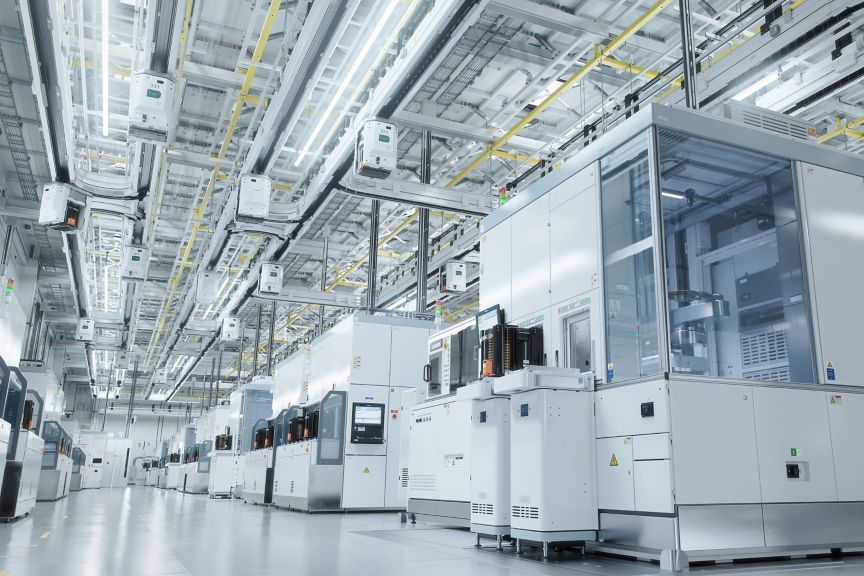 Modern smart factory with automated production lines, robotics, and advanced industrial systems improving efficiency, precision, and scalability.