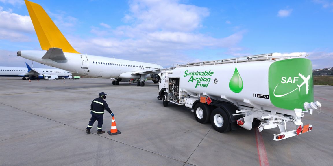Sustainable Aviation Fuel (SAF) truck is waiting for aircraft refueling operation at the airport.