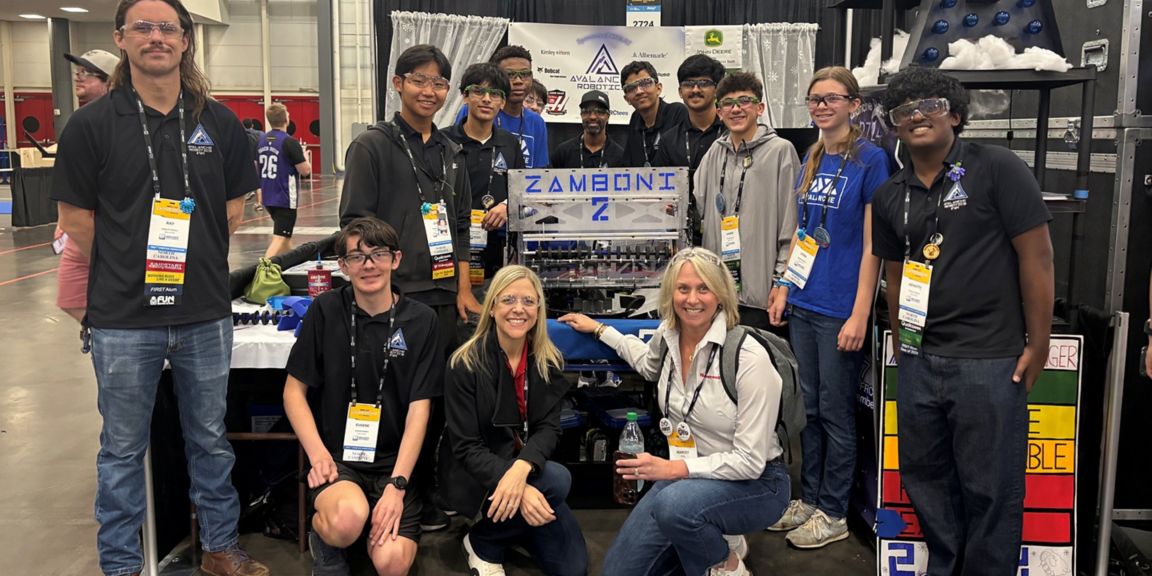 Students participate in a FIRST Robotics competition, developing STEM, engineering, coding and teamwork skills through hands-on innovation.