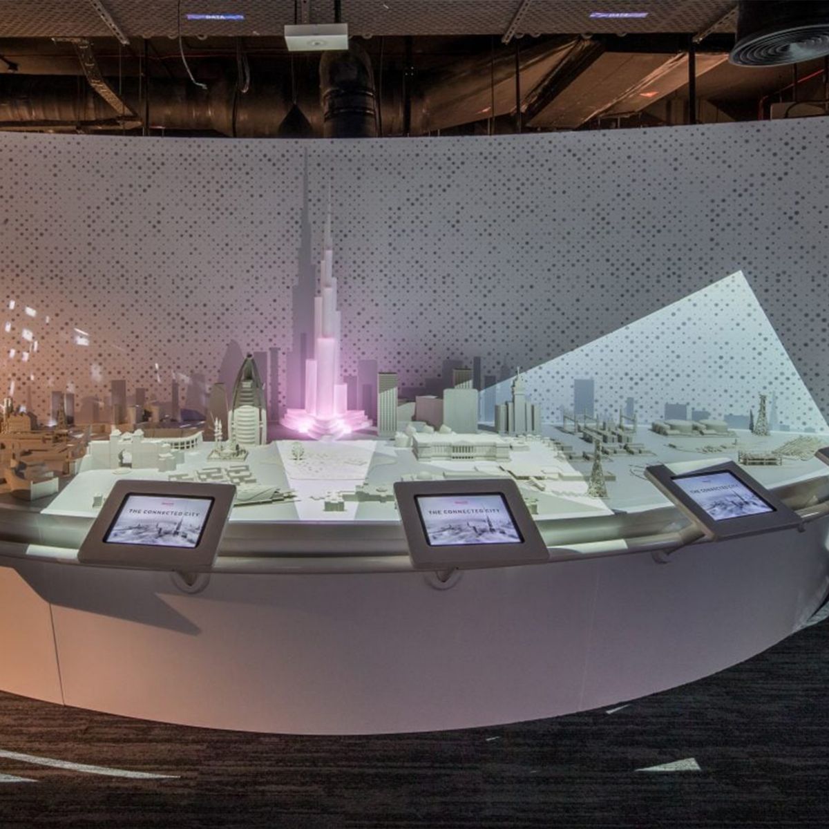 Explore a cutting-edge smart city model featuring interactive touchscreens, digital overlays, and urban data visualisation. Ideal for technology showcases, innovation labs, and urban planning concepts.