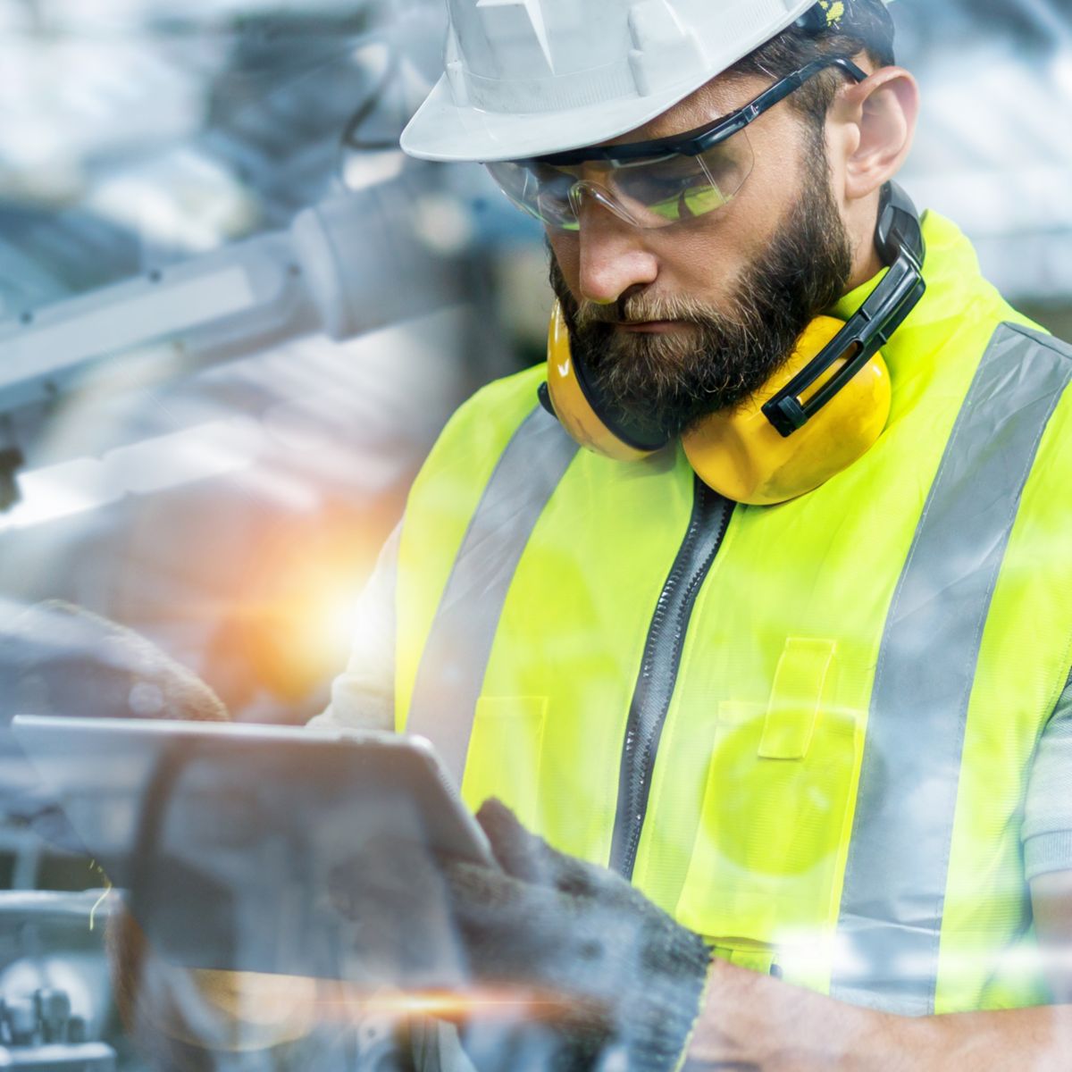 Manager or Industrial engineer working and control robotic with industry factory and network connection automation robot arm by tablet. AI, Artificial intelligence.