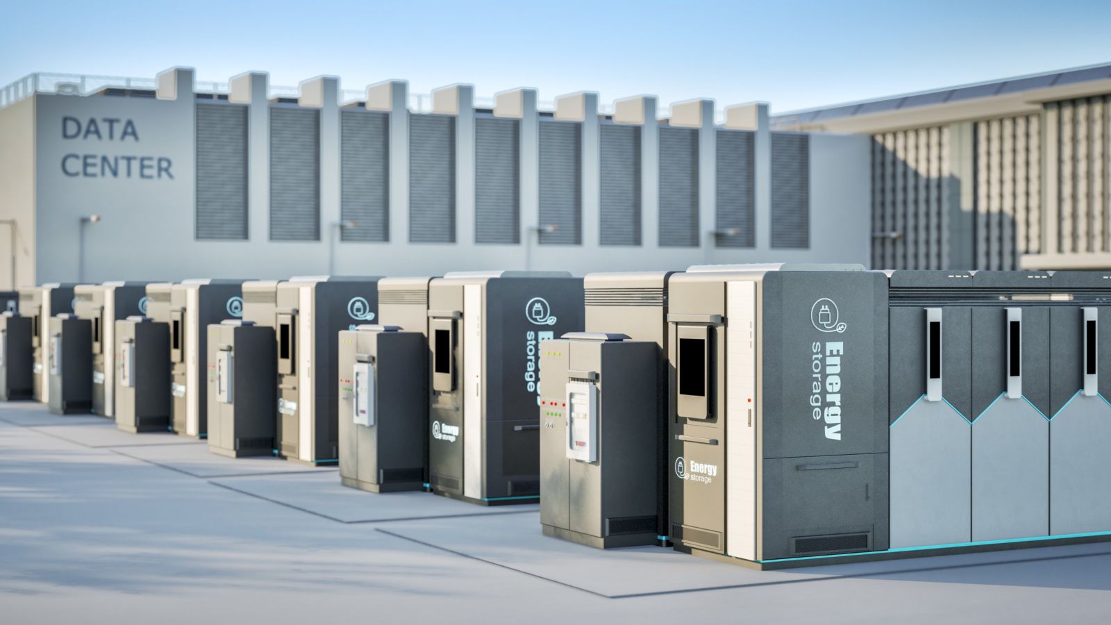 Rows of energy storage systems installed outside a modern data center building under a clear blue sky.