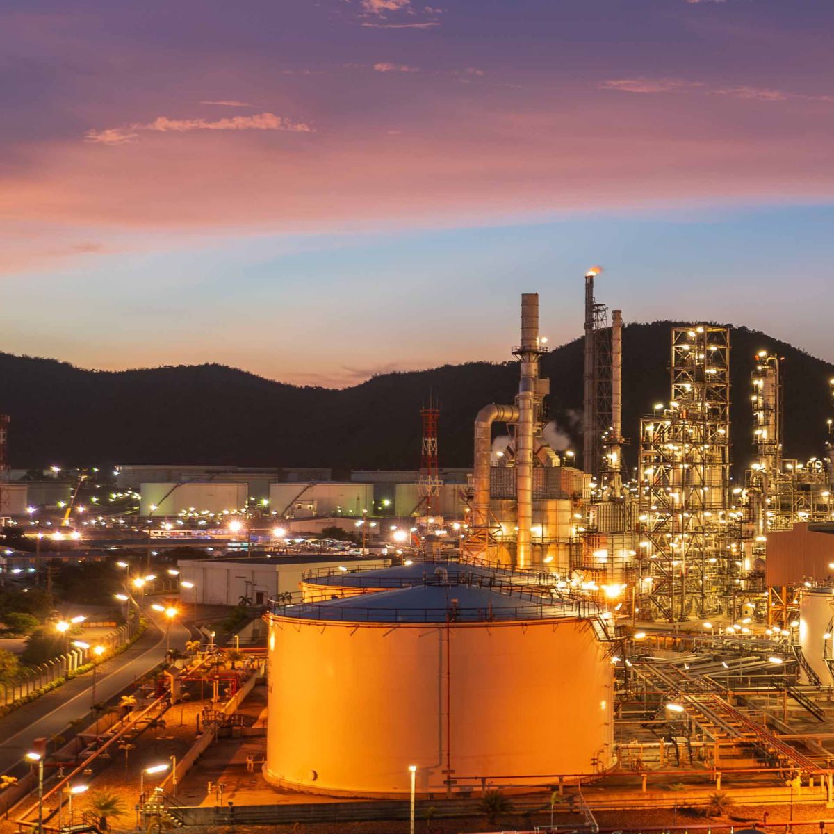 Industrial refinery facility showcasing large-scale energy production, processing operations and critical infrastructure performance.