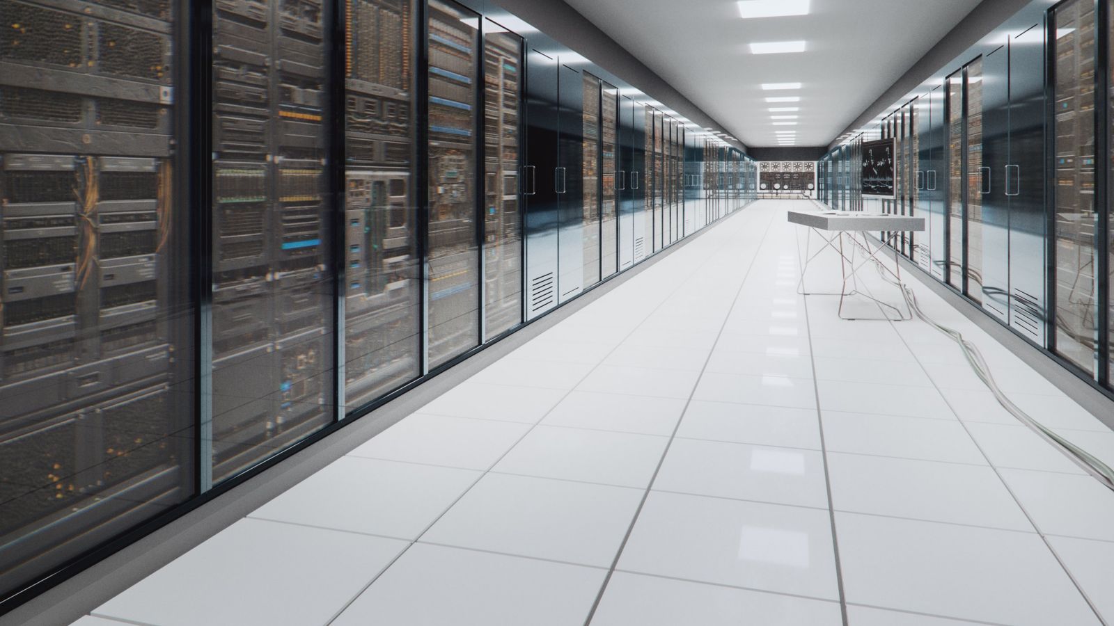 A clean, symmetrical perspective of a high-tech server room facility with rows of glass-encased hardware and a centralized diagnostic workstation.
