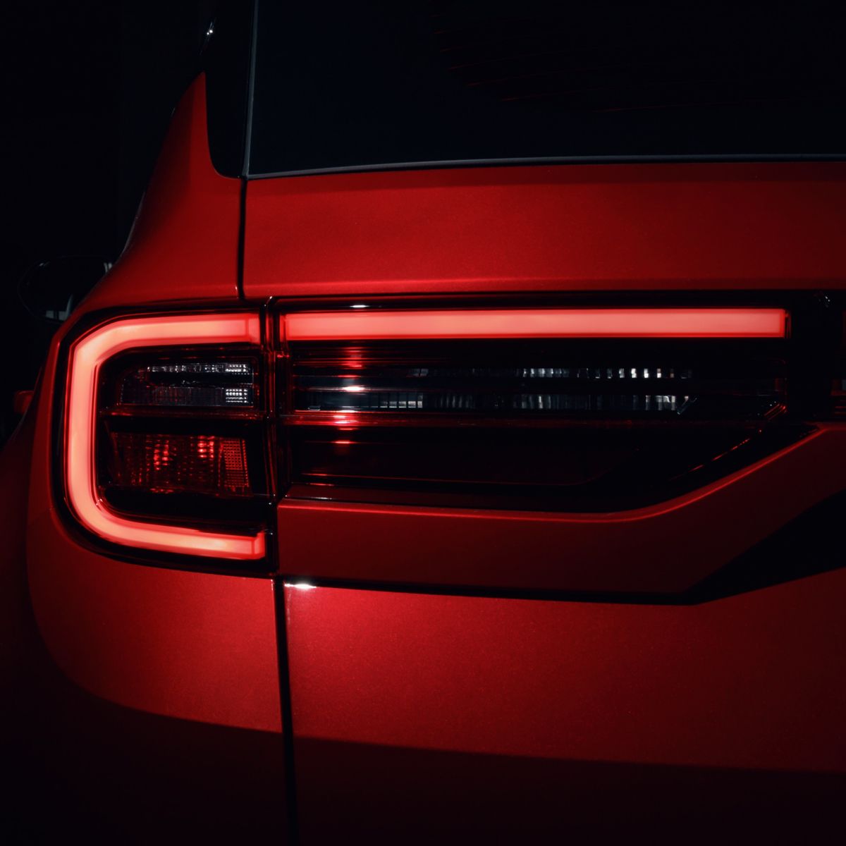 Detail on the rear light of a car. Car detail. Developed Car's rear brake light. The car is in the showroom