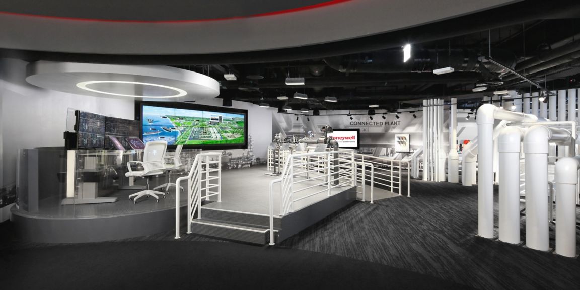 Industrial exhibit highlighting Honeywell connected plant systems, automation technologies, and operational excellence tools for manufacturing environments.